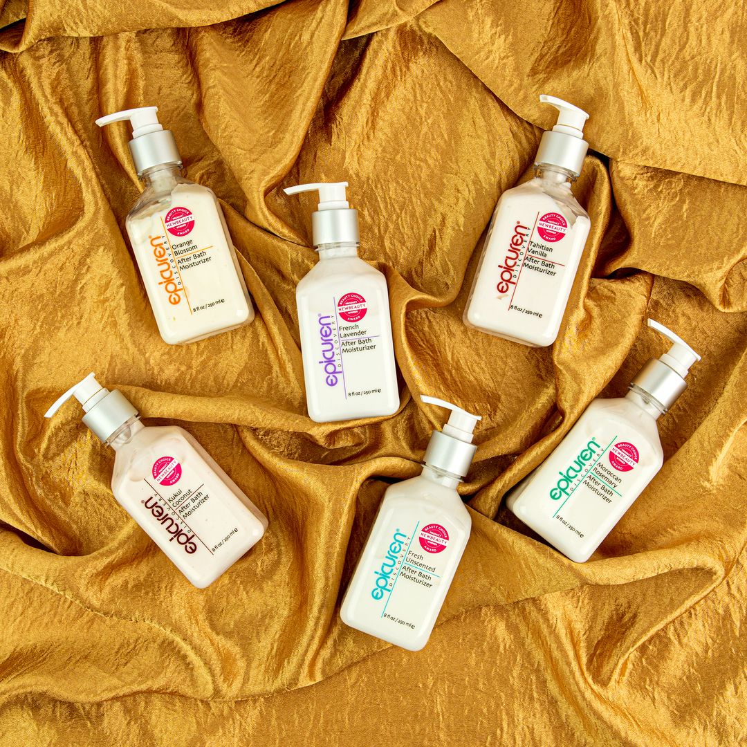 Multiple bottles of Epicuren skincare products on a yellow fabric background