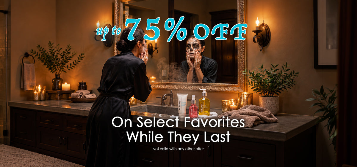 Lady looking in the bathroom mirror with text that says up to 75% off on select favorites while they last