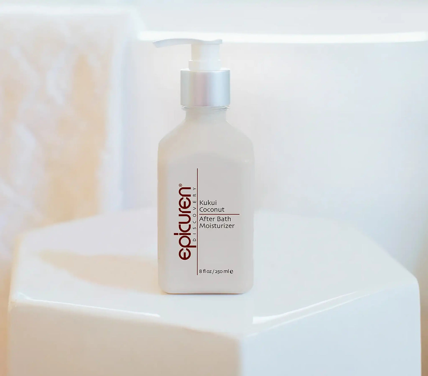 Epicuren Kukui Coconut After Bath bottle on a white surface