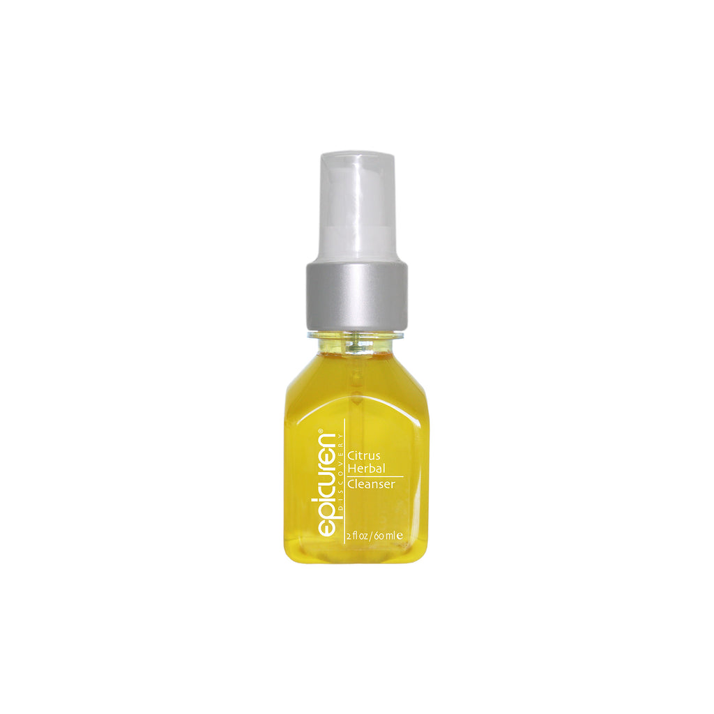 A yellow pump bottle of citrus herbal cleanser by Epicuren.